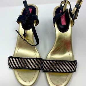 Women’s gold and black open toe stilettos size 9.5